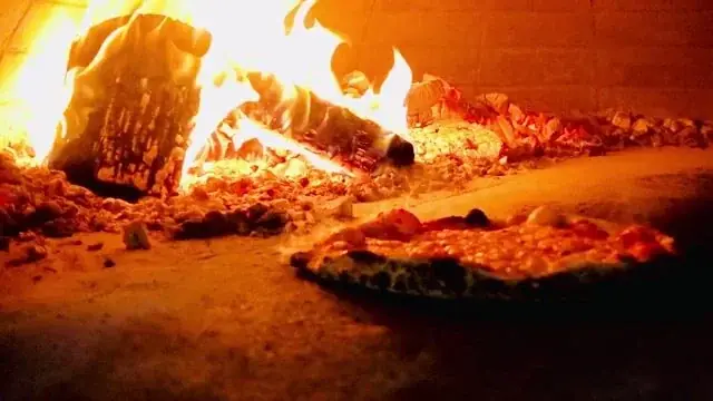 A wood-fired margherita pizza fresh from the Square Peg oven